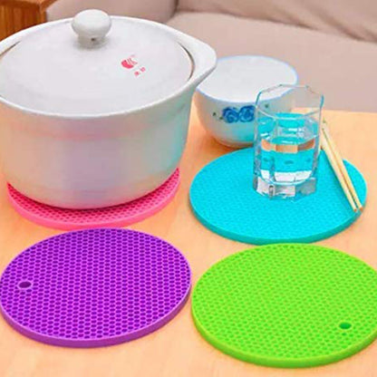 4 Pc Silicon Hot Mat For Placing Hot Vessels And Utensils Over It Easily Without Having Any Visible Marks On Surfaces.