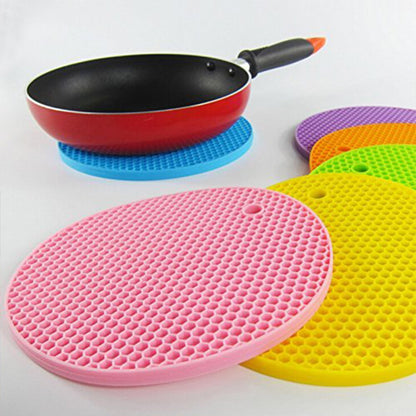 4 Pc Silicon Hot Mat For Placing Hot Vessels And Utensils Over It Easily Without Having Any Visible Marks On Surfaces.